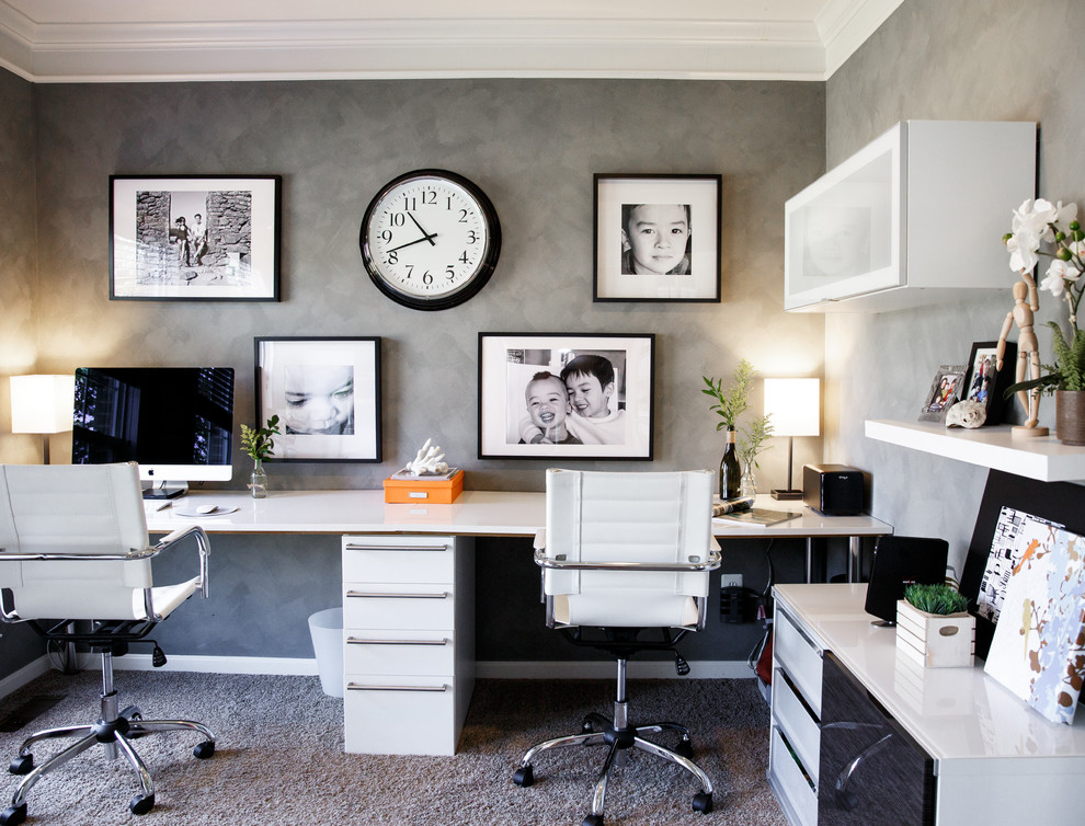 Photo of a small modern study room in DC Metro with grey walls, carpet and a freestanding desk.