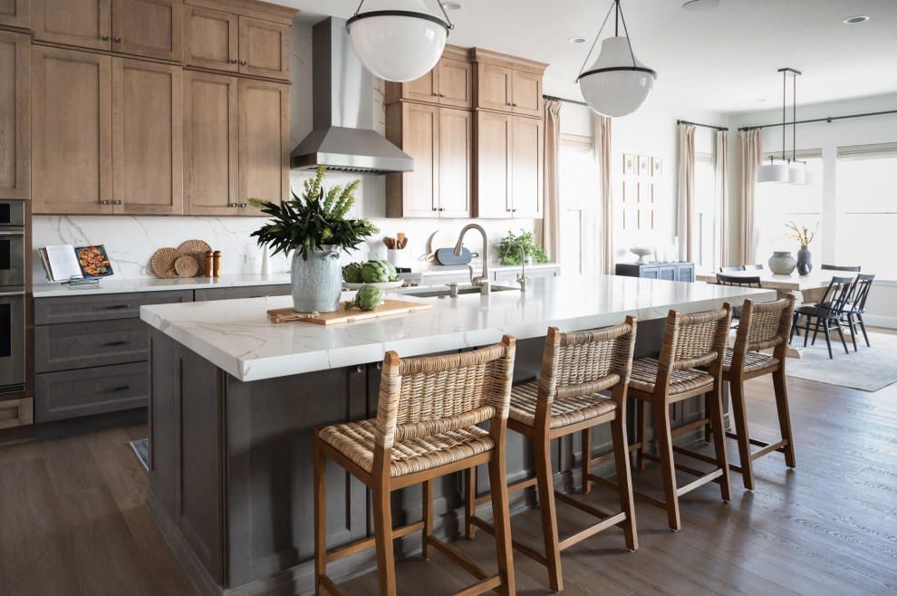 Example of a transitional kitchen design in Denver