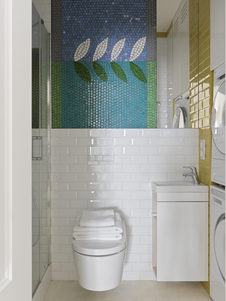Small contemporary powder room in Moscow with flat-panel cabinets, white cabinets, a wall-mount toilet, white tile, ceramic tile, white walls, terrazzo floors, a wall-mount sink, terrazzo benchtops, white floor, white benchtops and a floating vanity.