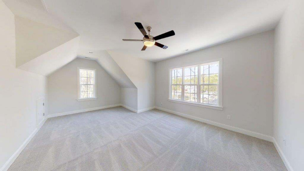 Design ideas for a large traditional loft-style family room in Raleigh with a game room, grey walls, carpet, no fireplace, no tv, white floor and vaulted.