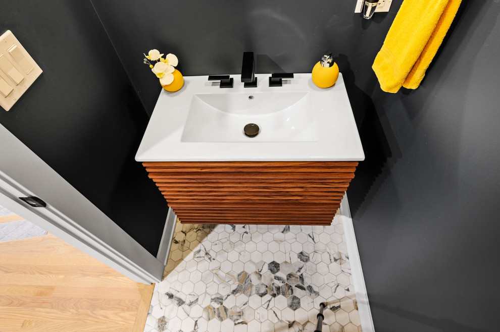 Small cloakroom in Chicago with louvered cabinets, medium wood cabinets, a one-piece toilet, blue walls, mosaic tile flooring, an integrated sink, solid surface worktops, white floors, white worktops and a floating vanity unit.