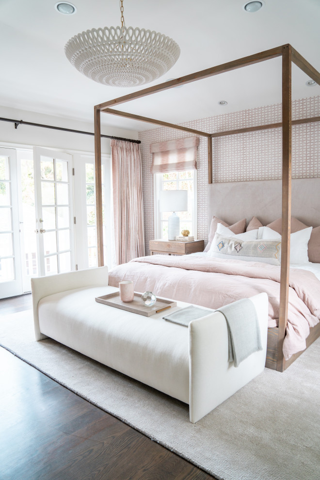 Inspiration for a beach style bedroom in Orange County with pink walls, dark hardwood floors and brown floor.