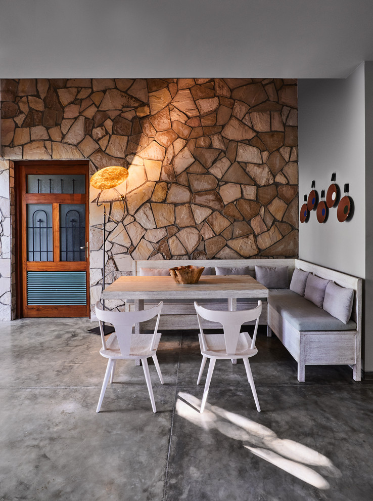 Dining room - tropical dining room idea in Bengaluru