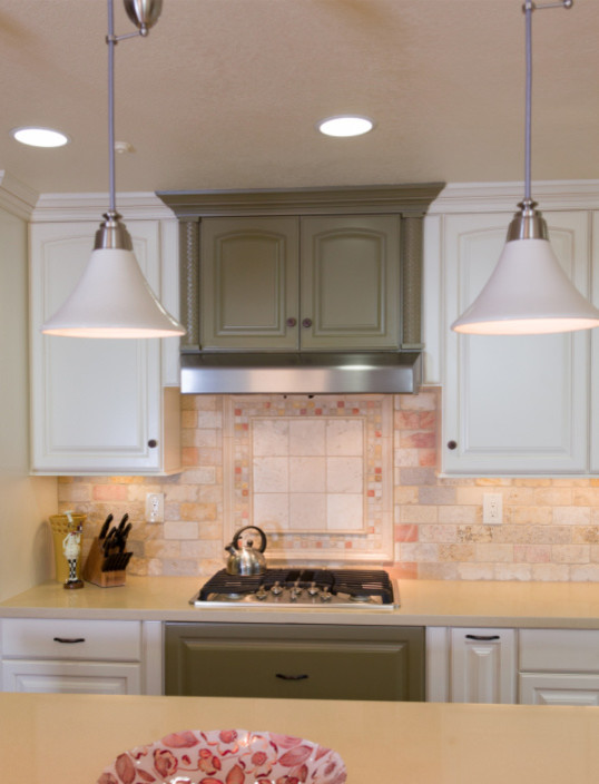 Inspiration for a mid-sized transitional l-shaped medium tone wood floor open concept kitchen remodel with a double-bowl sink, raised-panel cabinets, white cabinets, white backsplash, stainless steel appliances and an island