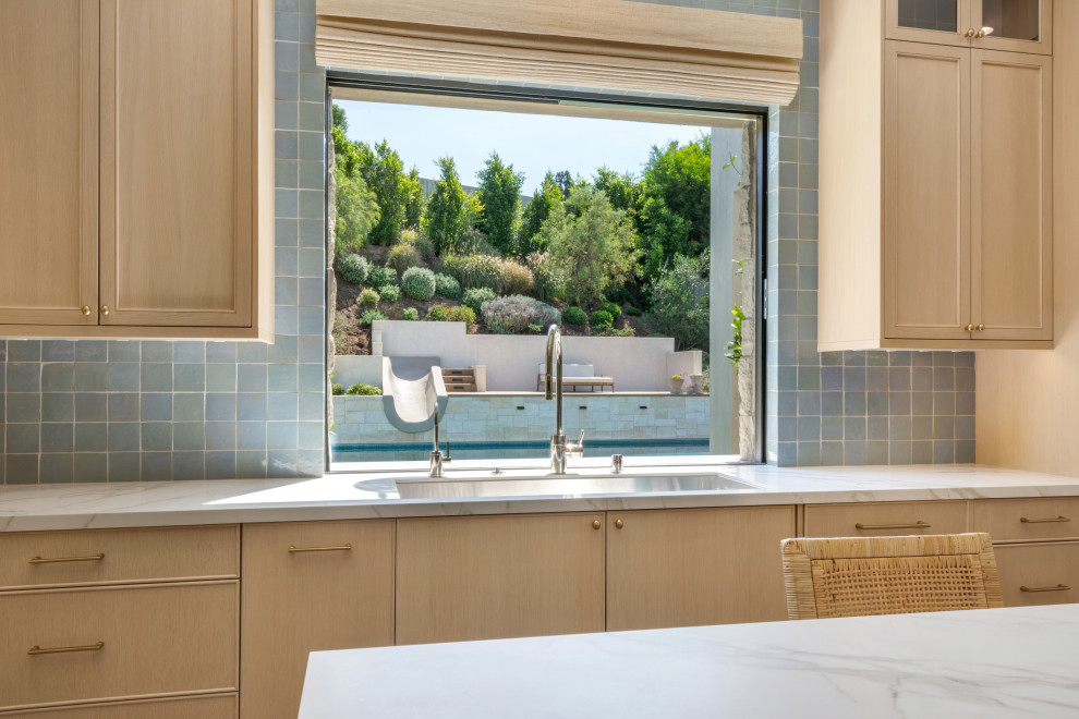 Example of a transitional home design design in Orange County