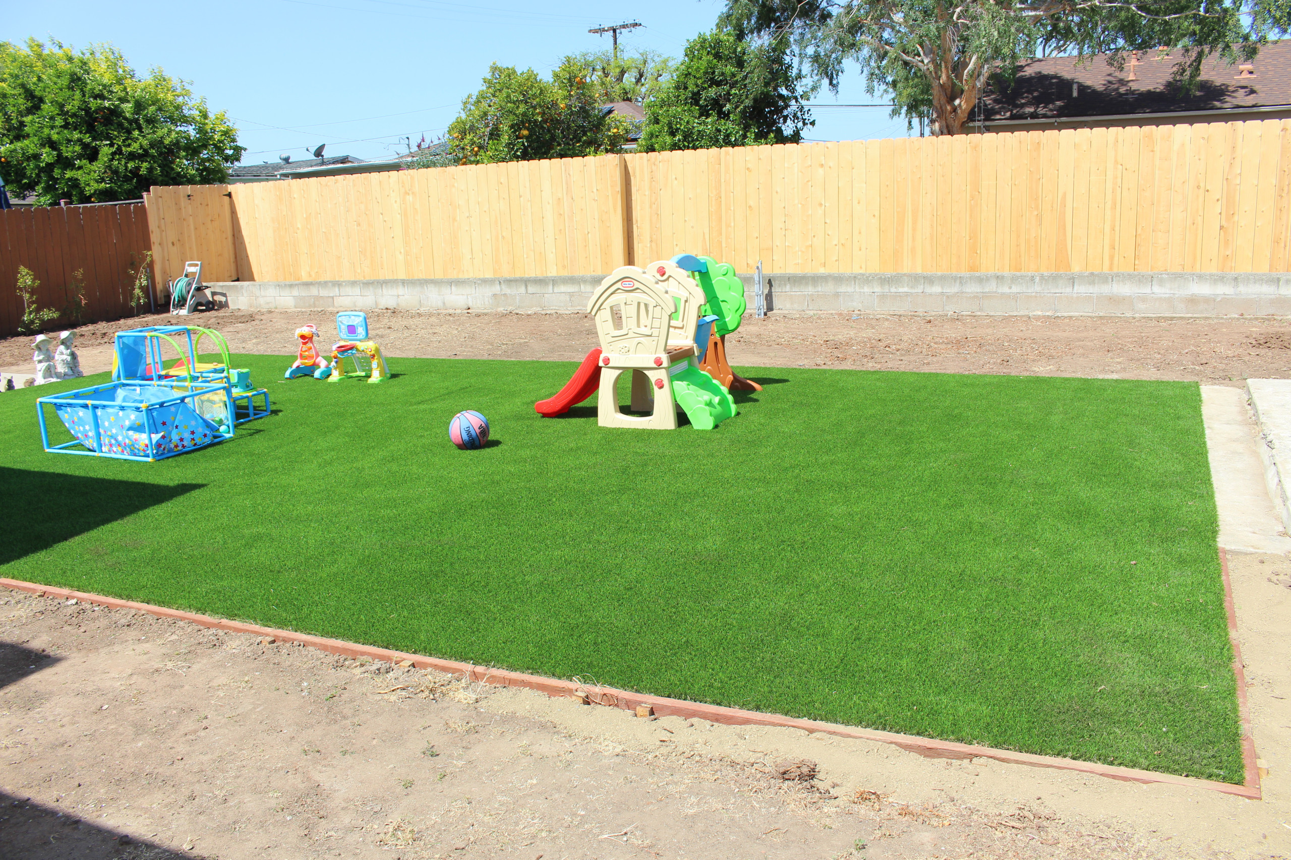 Artificial Lawn Install with Drought tolerant landscape