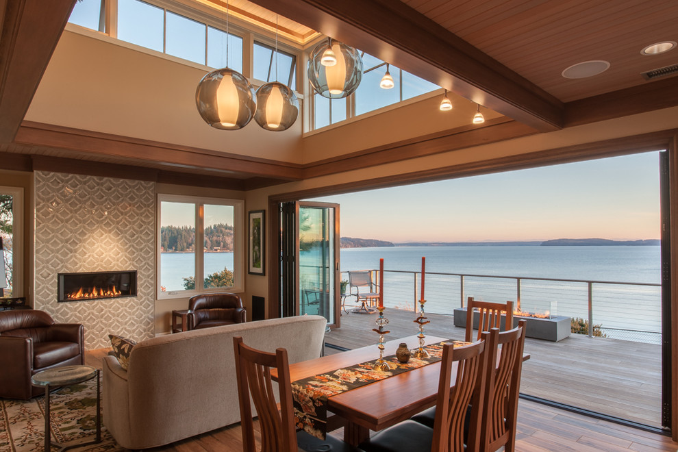This is an example of a beach style sunroom in Seattle.