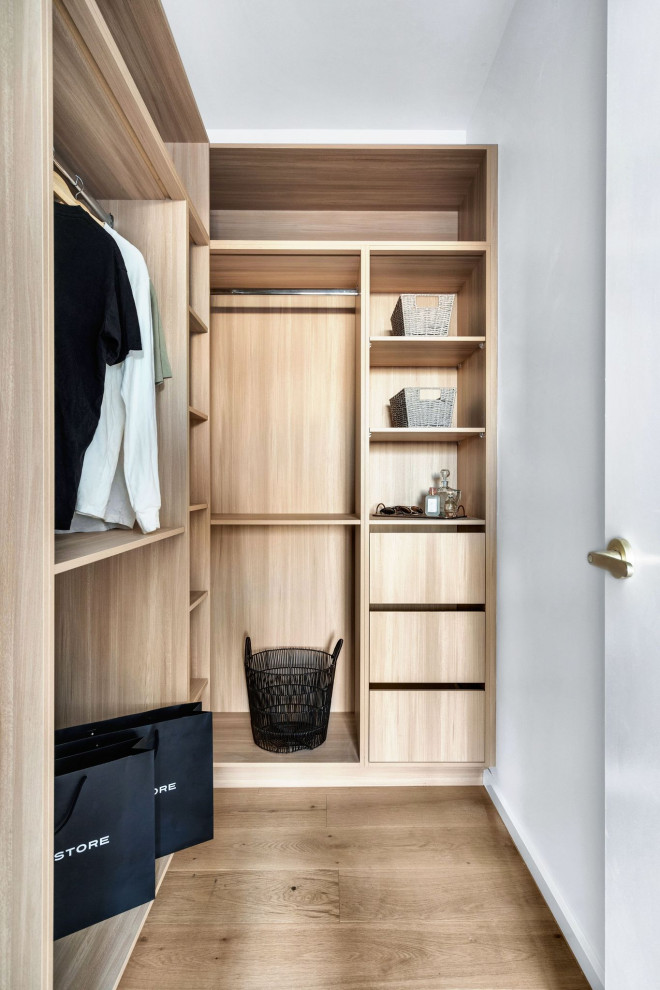 This is an example of a contemporary storage and wardrobe in Melbourne.