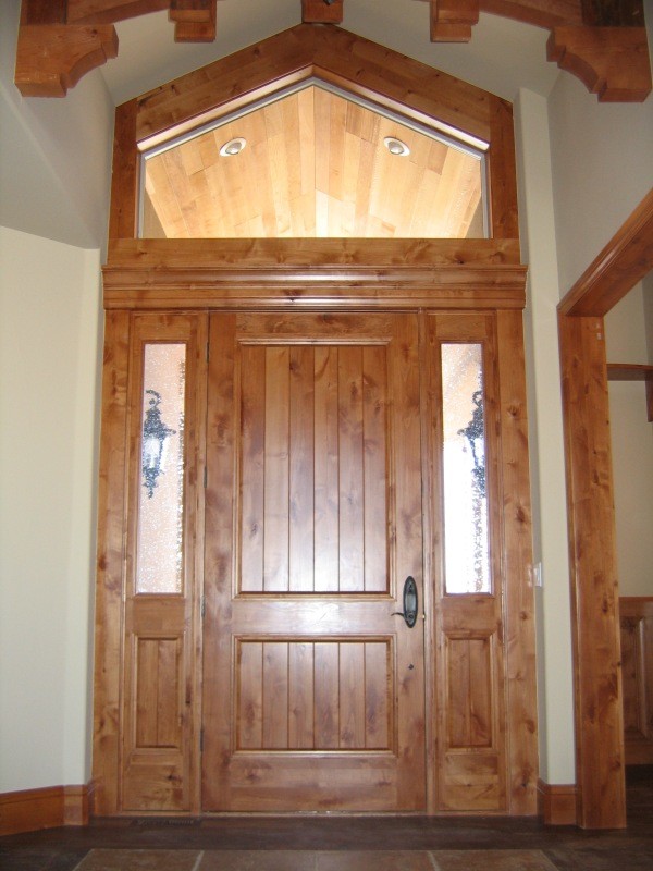 Front door - mid-sized rustic front door idea in Denver with white walls and a white front door