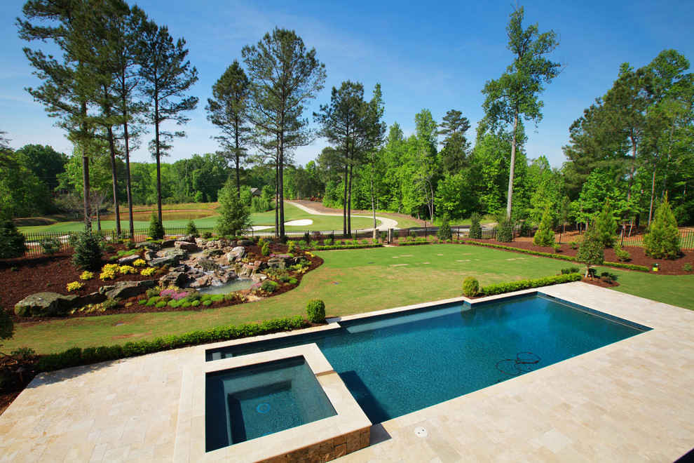 Transitional backyard custom-shaped pool in Atlanta.