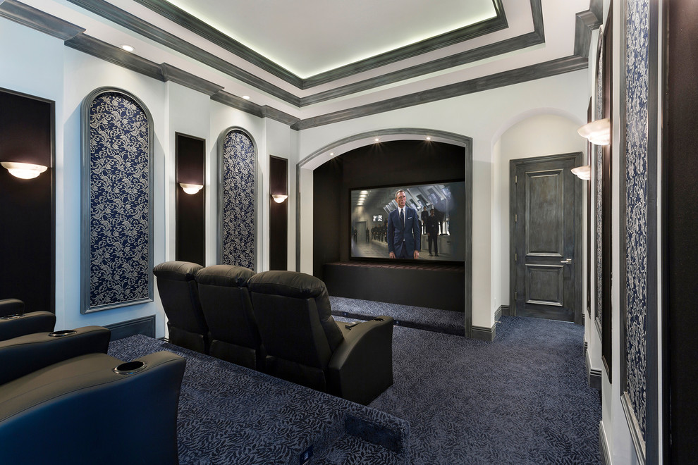 Photo of an expansive tropical enclosed home theatre in Other with multi-coloured walls, carpet, a wall-mounted tv and blue floor.