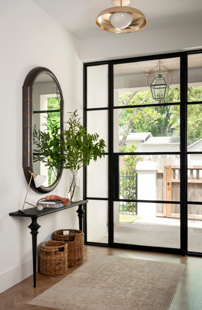 Example of a transitional entryway design in Austin