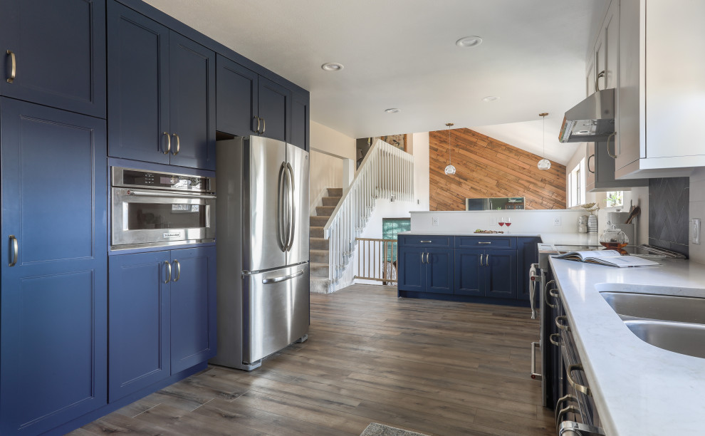 Example of a mid-sized transitional kitchen design in Denver