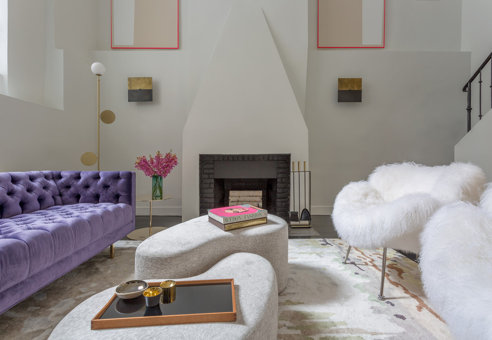 West Village Pied-A-Terre - Notable decor elements include: Manzanares ottomans,
Las Venus Modern tufted sofa,
Areti Plates floor lamp from Camerich,
Apparatus Buddy sconces,
The Rug Company Tidal rug,
Pilgrim Art fireplace tools from A la Mod Inc,
Cappellini Gong side table,
Photography: Francesco Bertocci