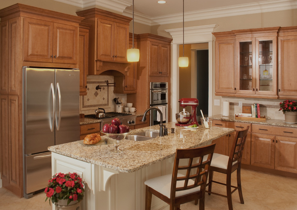 Traditional kitchen in Minneapolis with granite benchtops and beige benchtop.