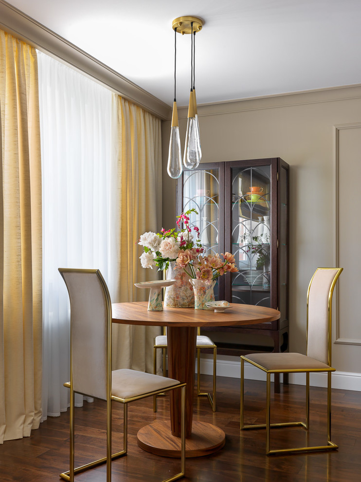 Photo of a transitional dining room in Other.