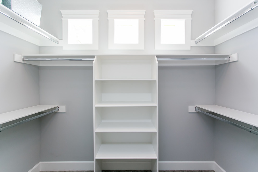 Example of a transitional closet design in Seattle