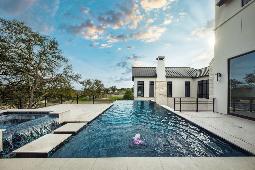 Inspiration for a transitional pool remodel in Austin