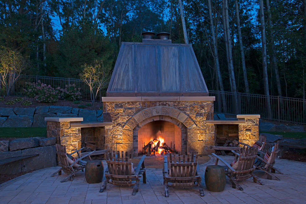 Design ideas for a country patio in Minneapolis with no cover and with fireplace.