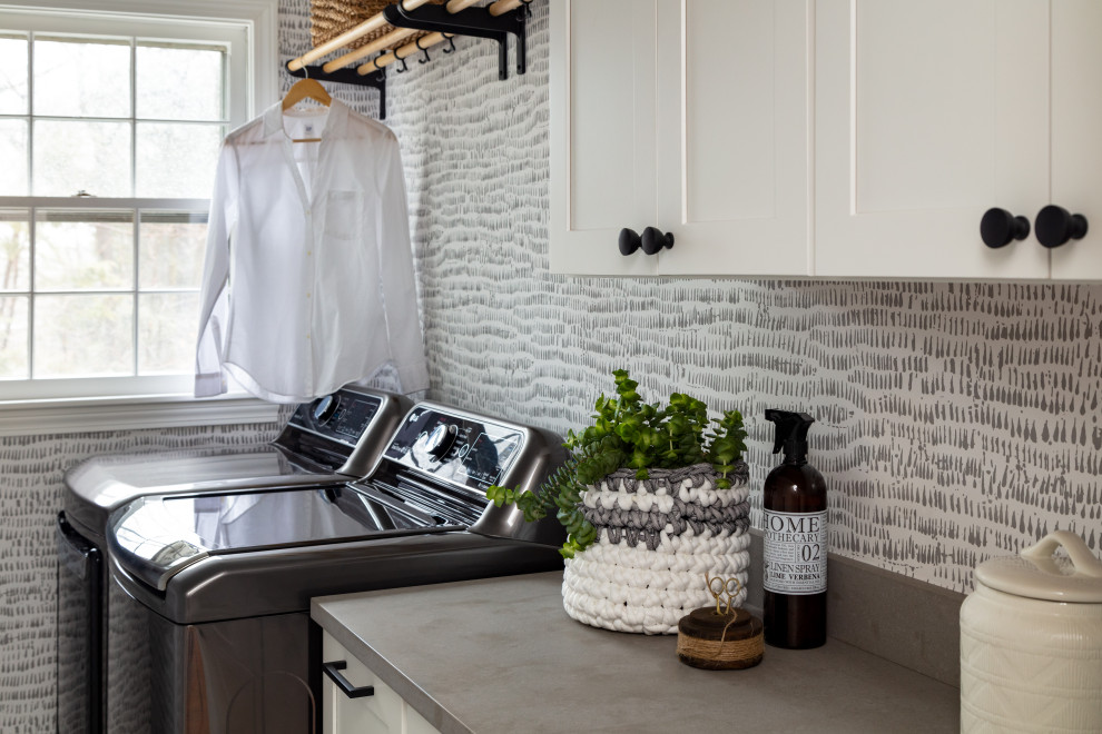 Photo of a small transitional single-wall dedicated laundry room in Boston.