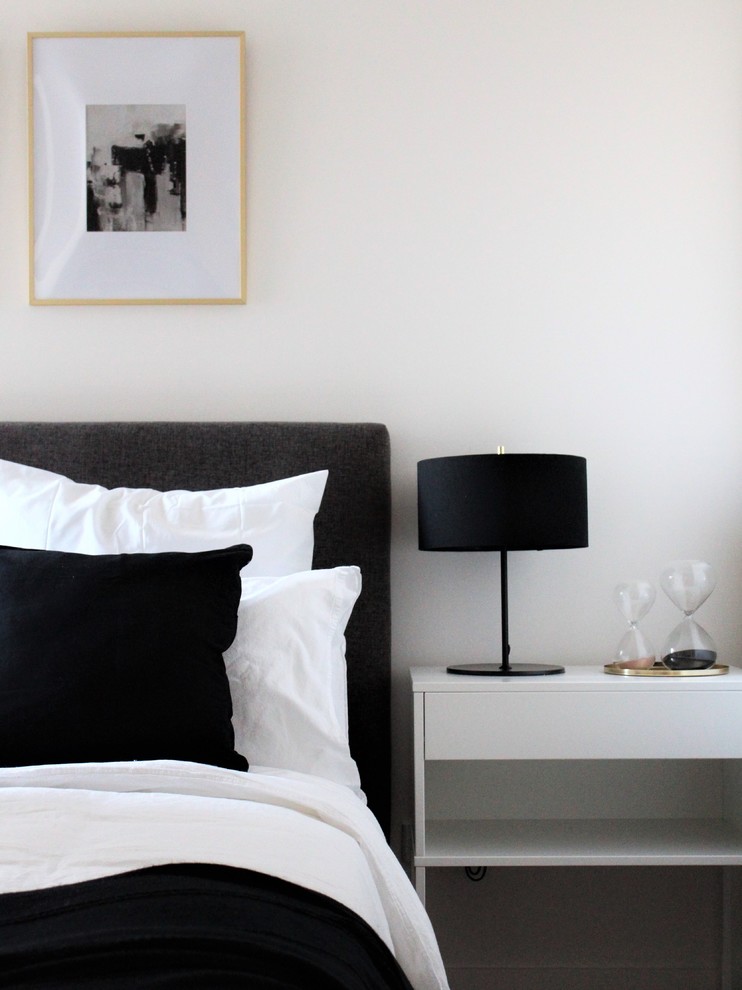 Photo of a mid-sized contemporary guest bedroom in Melbourne with white walls, carpet, no fireplace and grey floor.