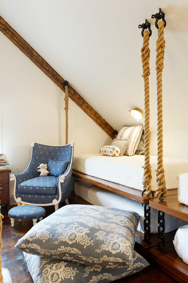 Photo of a beach style kids' bedroom in Boston with white walls and dark hardwood floors.