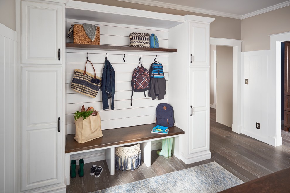 Entryway - mid-sized transitional galley entryway idea with raised-panel cabinets and white cabinets
