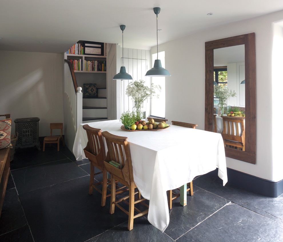 Inspiration for a small country dining room in Cornwall with white walls.