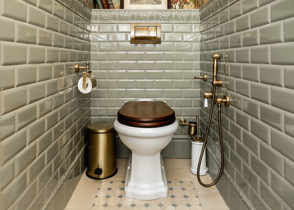 Photo of a small traditional kids bathroom in Moscow with recessed-panel cabinets, red cabinets, a wall-mount toilet, green tile, ceramic tile, multi-coloured walls, ceramic floors, an integrated sink, beige floor, white benchtops, a single vanity, a freestanding vanity, recessed and wallpaper.