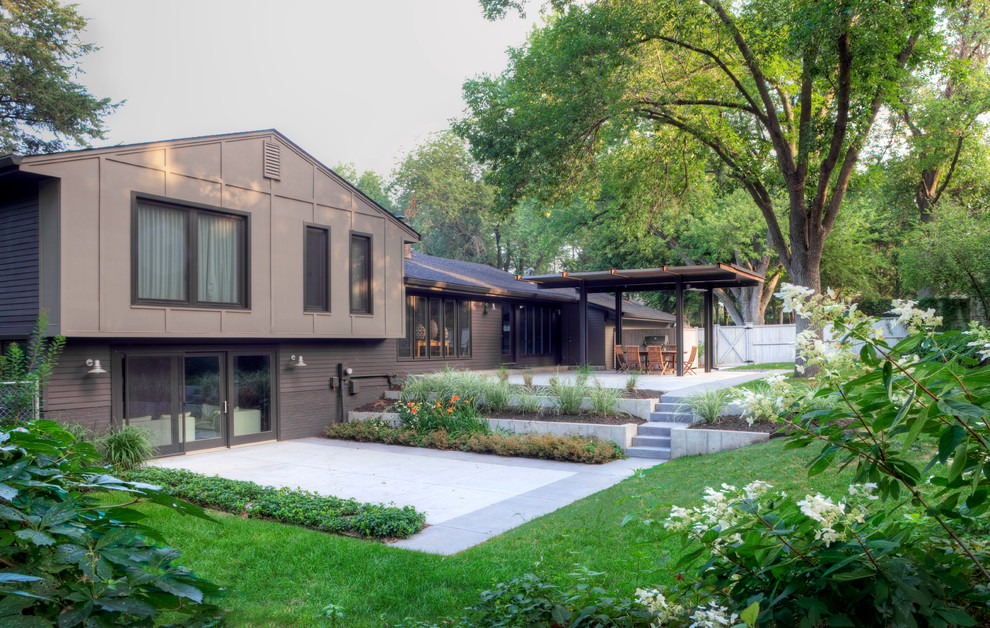 Photo of a contemporary backyard patio in Omaha.