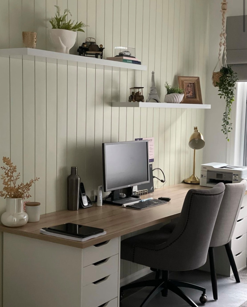 Mid-sized scandinavian study room in Melbourne with beige walls, carpet, no fireplace, a freestanding desk, grey floor and panelled walls.