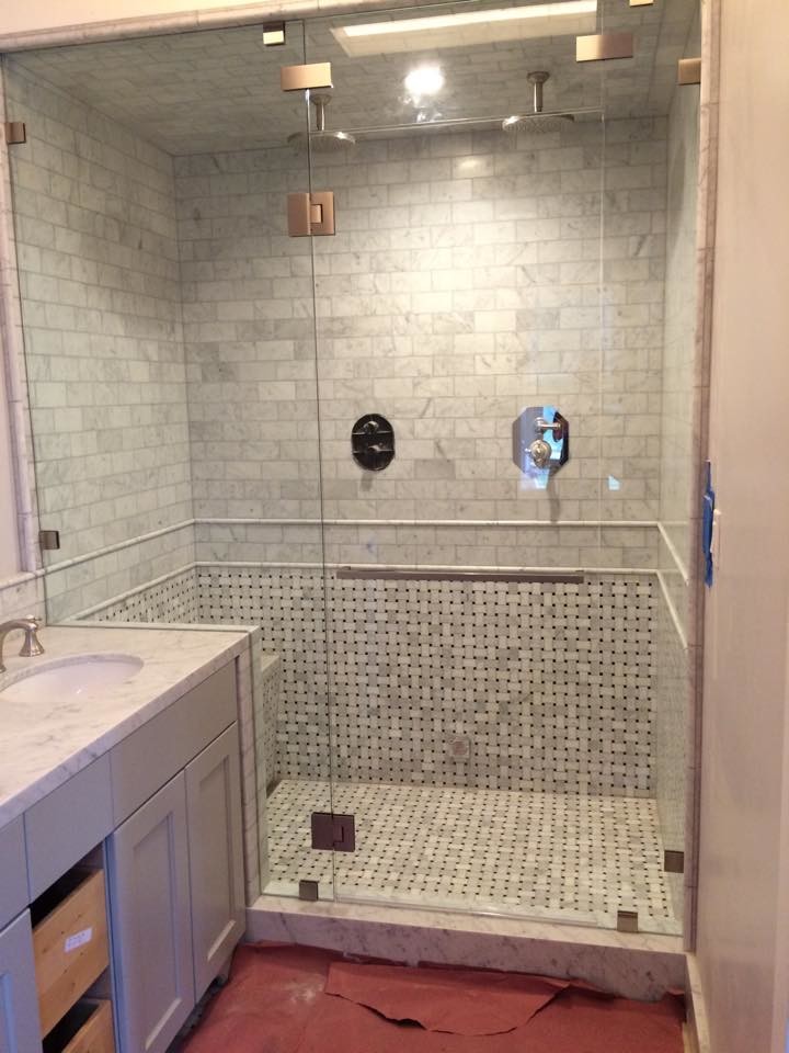 Small transitional 3/4 bathroom in San Francisco with black tile, black and white tile, white tile, matchstick tile, white walls, recessed-panel cabinets, grey cabinets, an alcove shower, an undermount sink, marble benchtops and a hinged shower door.