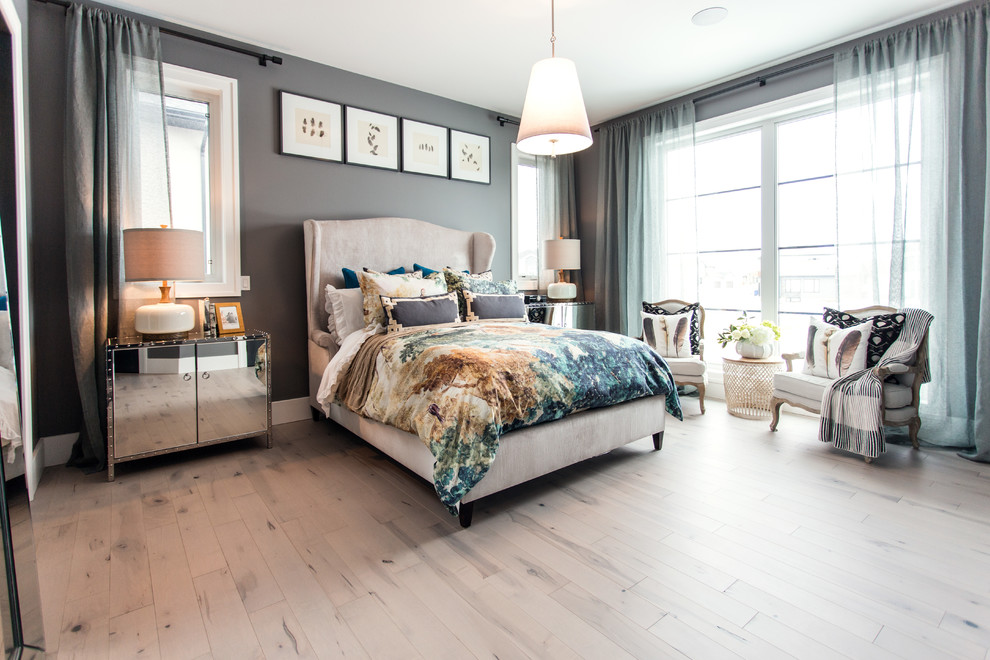 Large transitional master light wood floor and beige floor bedroom photo with gray walls and no fireplace
