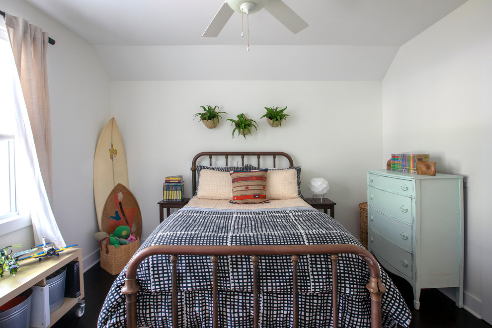 Photo of a beach style kids' bedroom with white walls.