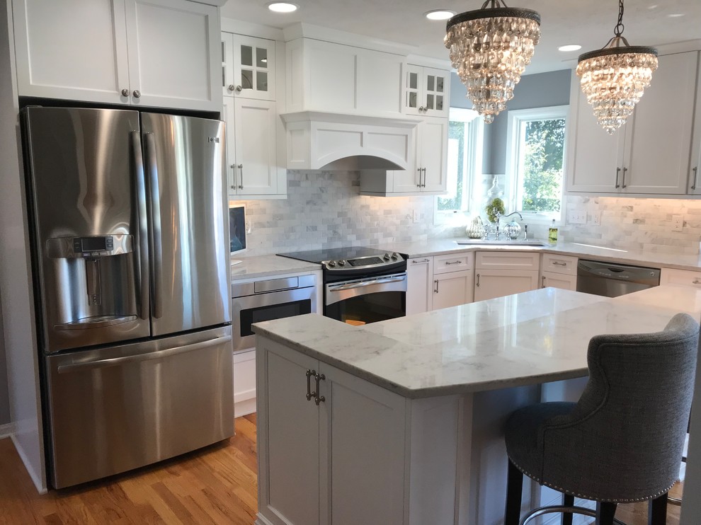 Example of a transitional kitchen design in Omaha