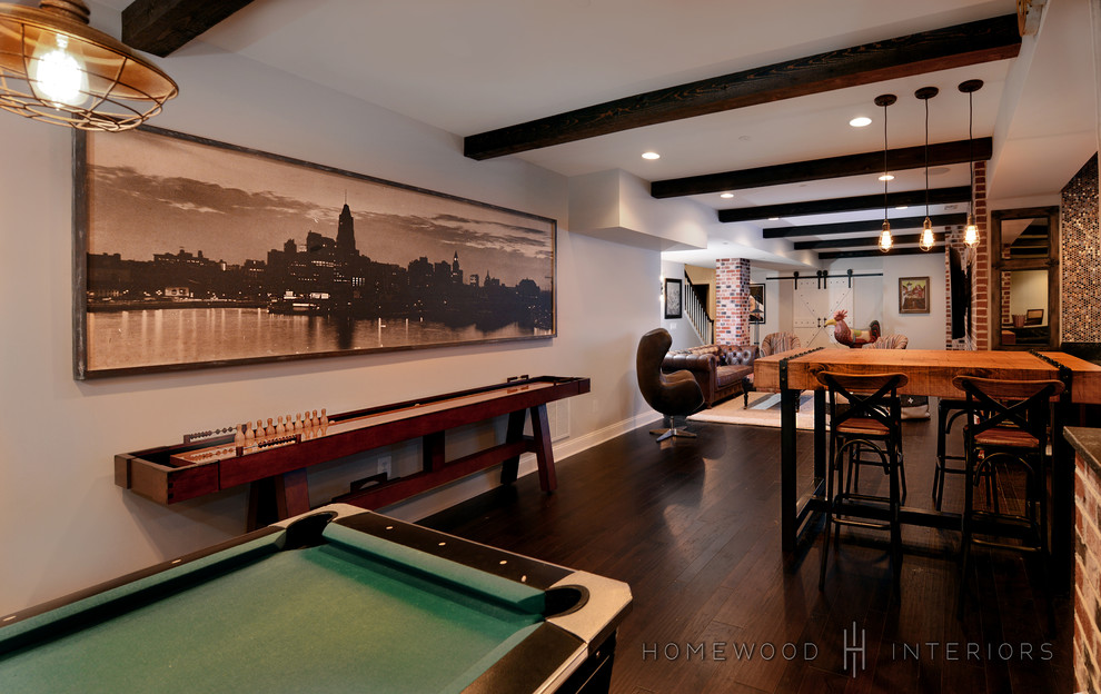 Inspiration for a large traditional basement in Baltimore with dark hardwood flooring and a brick fireplace surround.