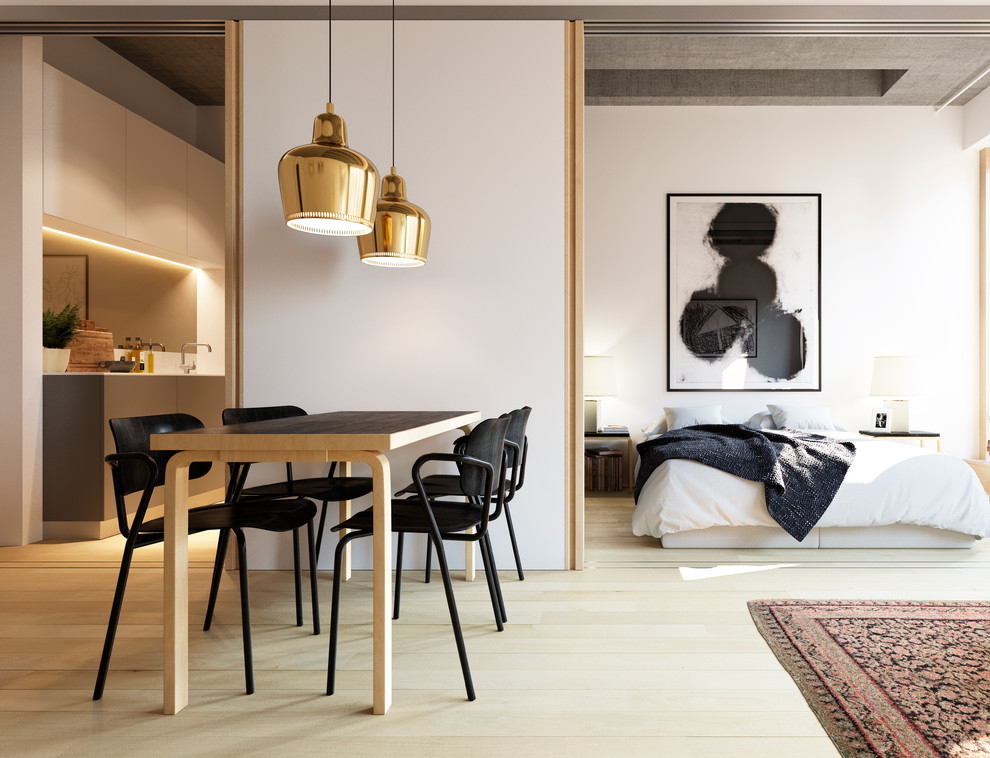Design ideas for a contemporary dining room in London with white walls and light hardwood floors.