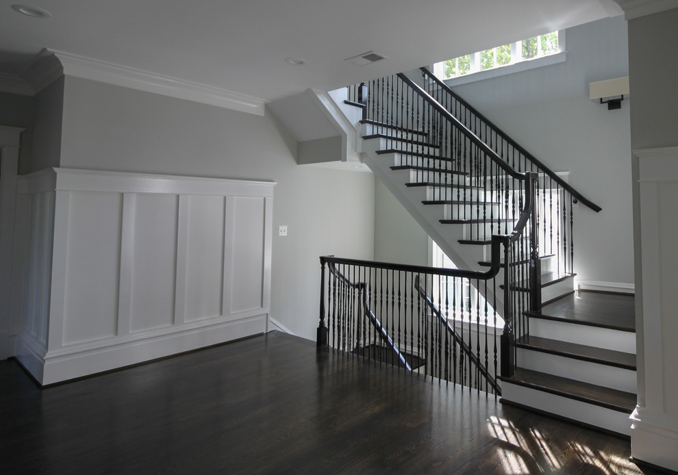 Staircase - large transitional wooden l-shaped mixed material railing staircase idea in DC Metro with painted risers