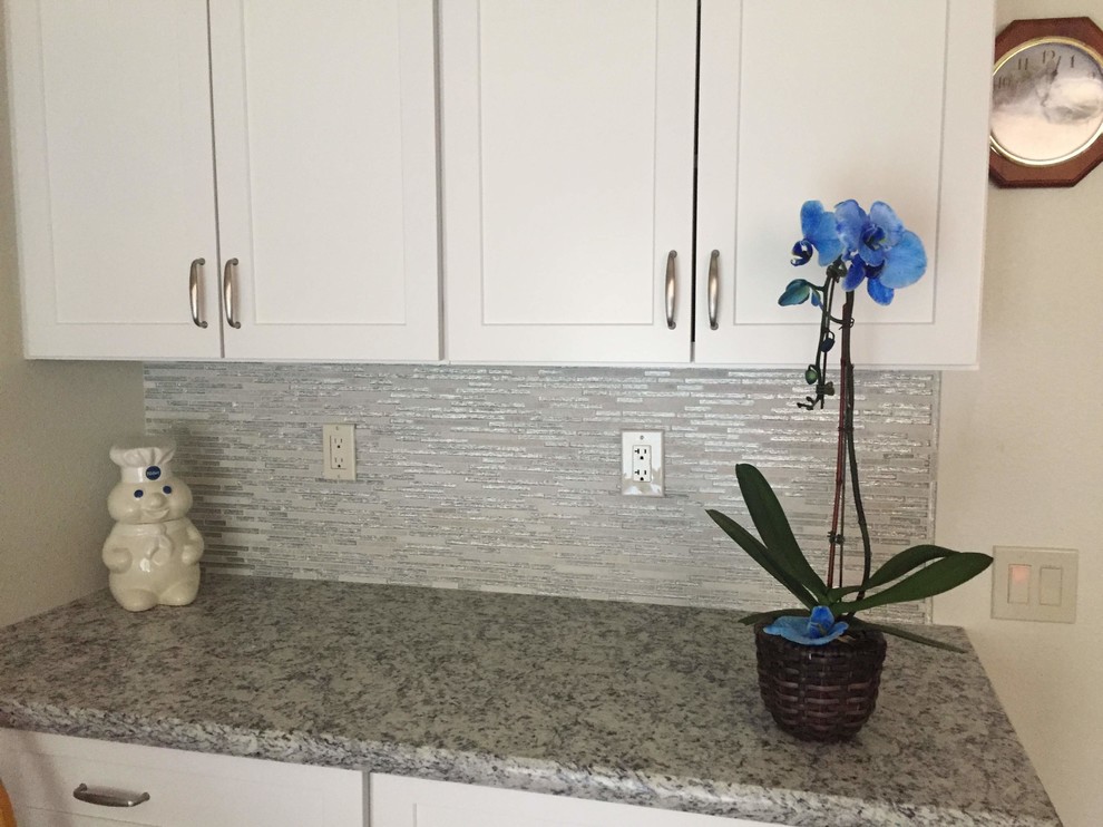 Transitional kitchen photo in Phoenix with shaker cabinets, white cabinets and granite countertops