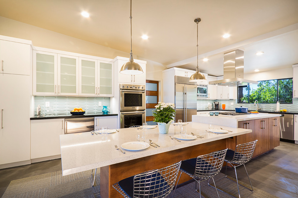 Open concept kitchen - large transitional open concept kitchen idea in Phoenix with an undermount sink, flat-panel cabinets, quartz countertops, blue backsplash, porcelain backsplash, stainless steel appliances and an island