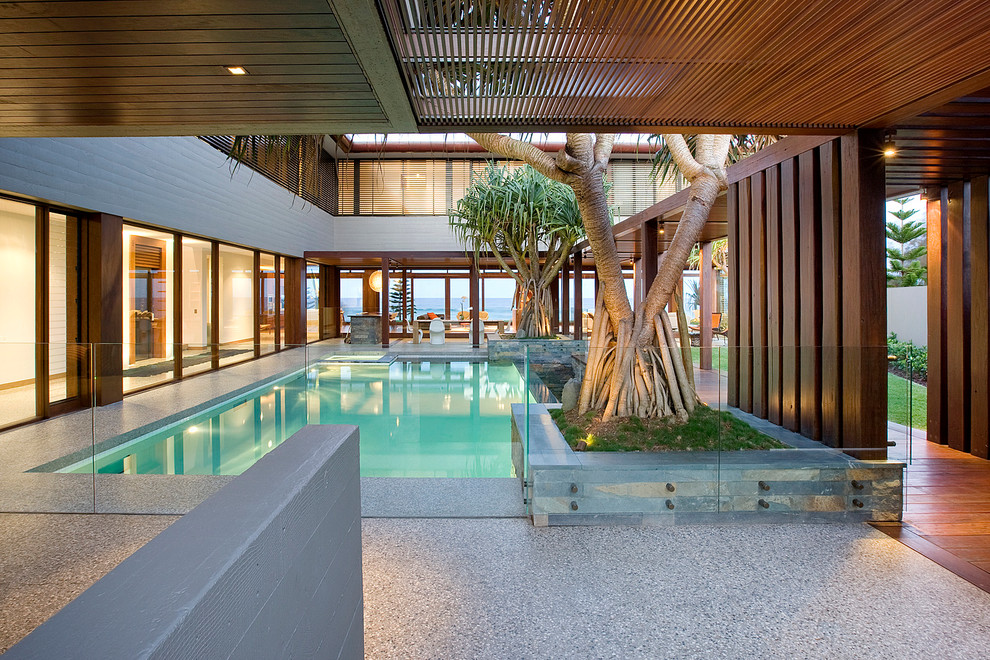 Photo of a contemporary courtyard rectangular pool in Gold Coast - Tweed.