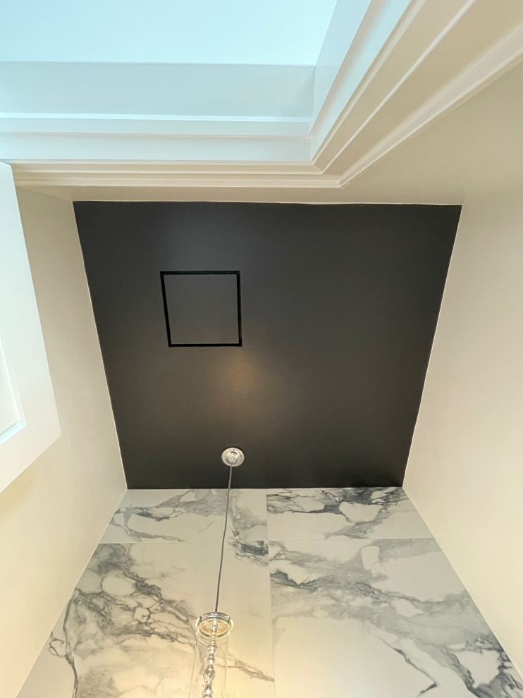 Example of a transitional home design design in Toronto