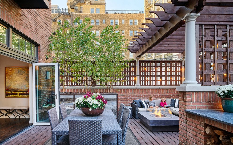 Deck - transitional deck idea in Chicago with a pergola