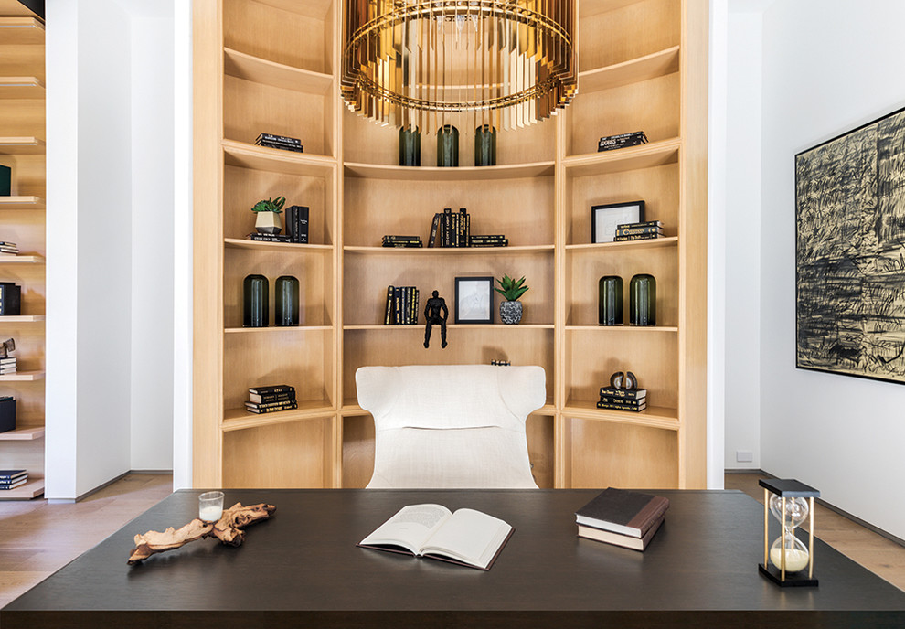 Study room - transitional freestanding desk study room idea in Los Angeles with white walls