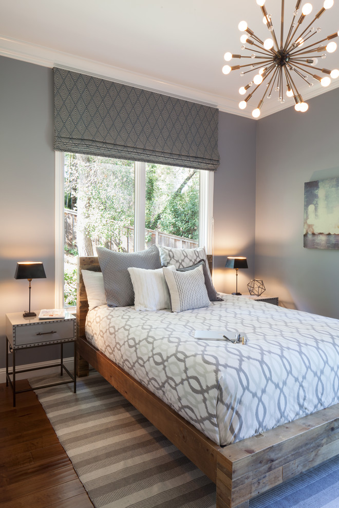 Inspiration for a mid-sized transitional guest dark wood floor and brown floor bedroom remodel in San Francisco with gray walls and no fireplace