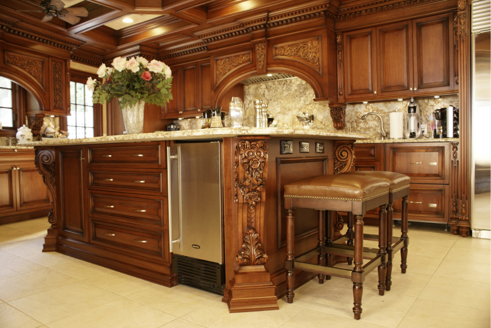 Large u-shaped kitchen/diner in New York with a built-in sink, shaker cabinets, brown cabinets, engineered stone countertops, beige splashback, engineered quartz splashback, stainless steel appliances, ceramic flooring, an island, beige floors, brown worktops and a coffered ceiling.