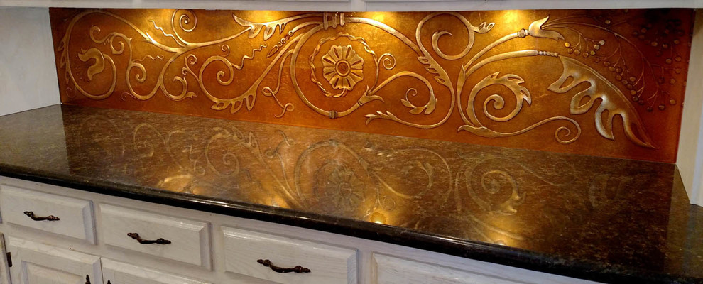 Kitchen - transitional kitchen idea in Austin with white cabinets, granite countertops, metallic backsplash and glass sheet backsplash