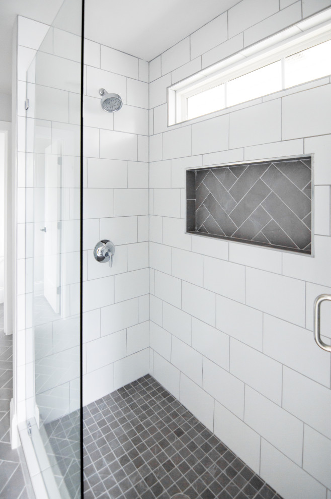 Design ideas for a large country master bathroom in Charlotte with recessed-panel cabinets, white cabinets, an alcove shower, grey walls, porcelain floors, an undermount sink, quartzite benchtops, grey floor, a hinged shower door and grey benchtops.