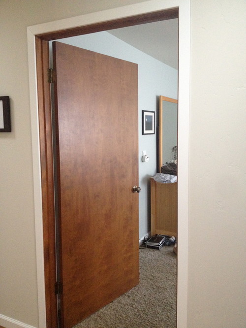 Interior doors - paint white or replace with white panel door?