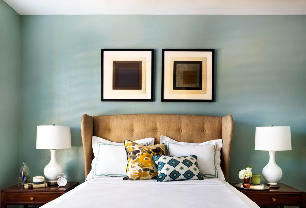 Photo of a large transitional guest bedroom in Portland with blue walls and carpet.